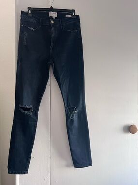 Frame Denim High-Rise Ripped Skinny Jeans in Dark Indigo